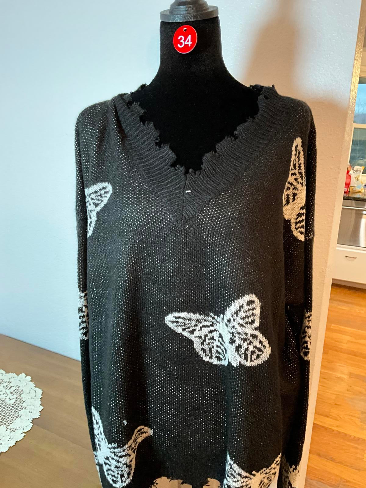 Trendy Three XL Black Knit Sweater with White Butterfly Pattern